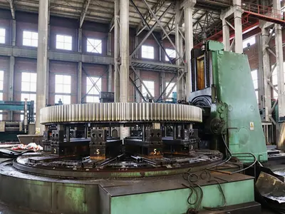Hobbing machine cutting a large gear