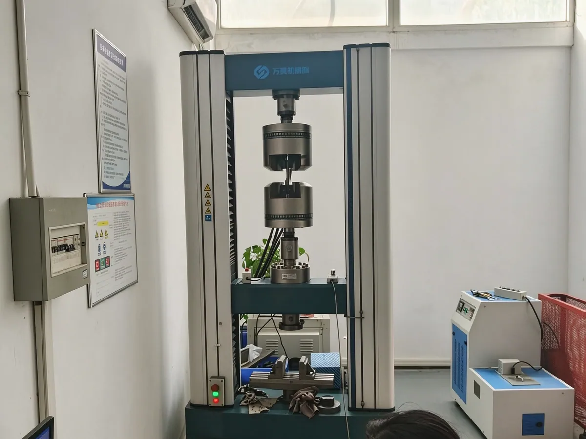 Tensile testing machine running a material test